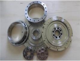 Ein Bild, das Zahnrad, Metallwaren, Autoteile, Im Haus enthält.
Automatisch generierte Beschreibung